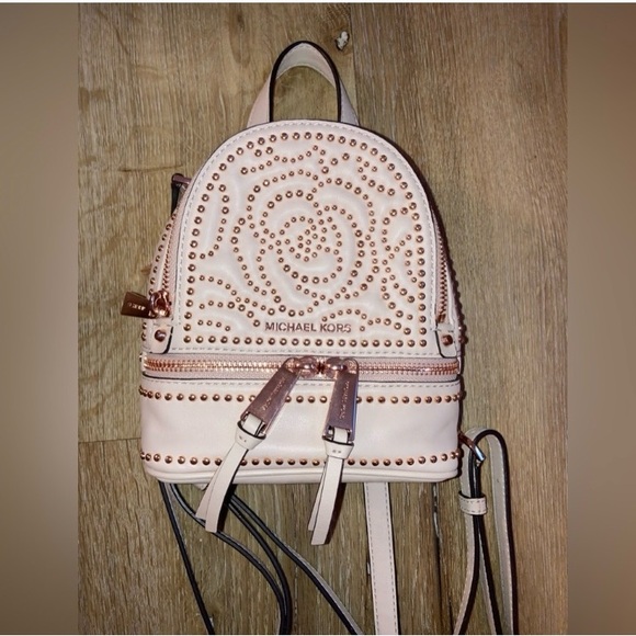Michael Kors Handbags - Michael Kors Rhea mini rose studded leather backpack